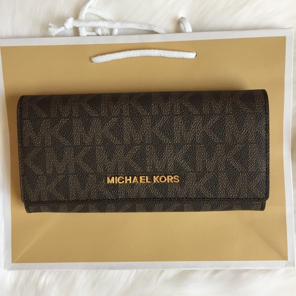 Michael Kors Handbags - Michael Kors LARGE carryall brown acorn wallet